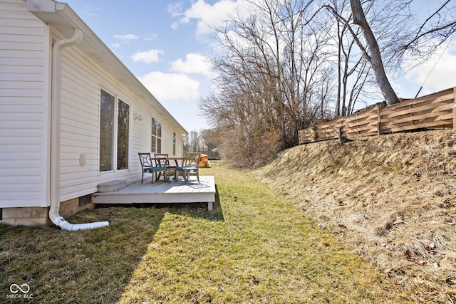 view of yard with a deck