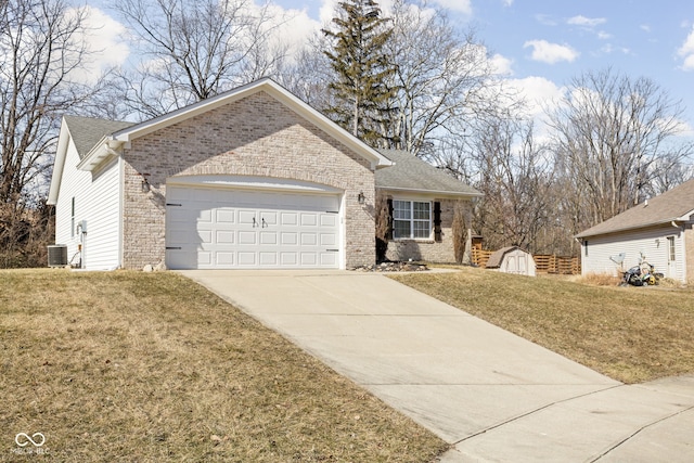 ranch-style house with a garage, a front yard, and brick siding