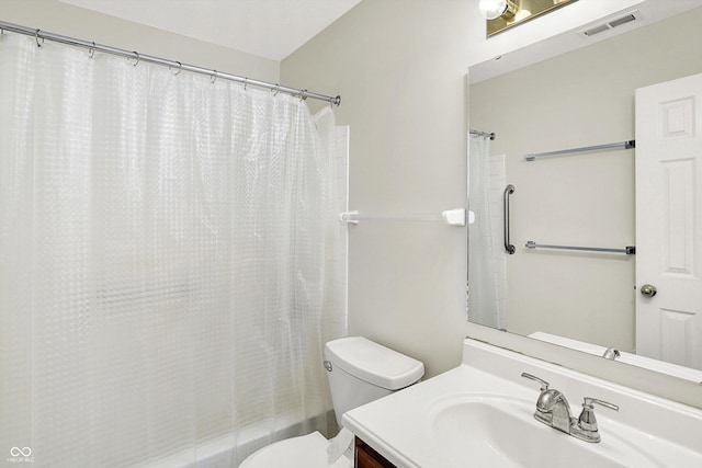 full bath with visible vents, vanity, toilet, and shower / tub combo with curtain