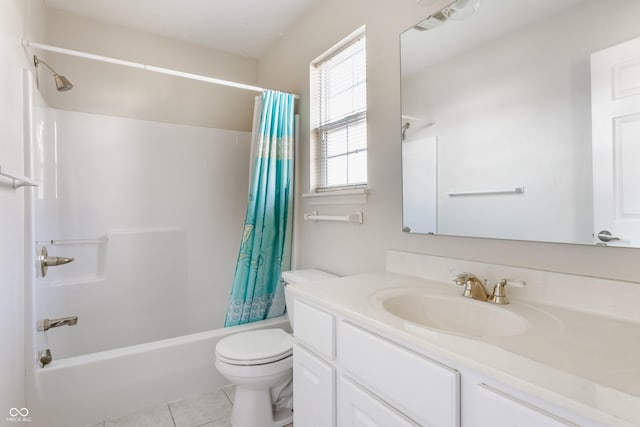 bathroom with shower / bath combo with shower curtain, toilet, vanity, and tile patterned flooring