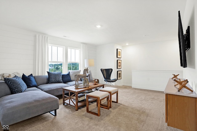 living room with light carpet, recessed lighting, and baseboards