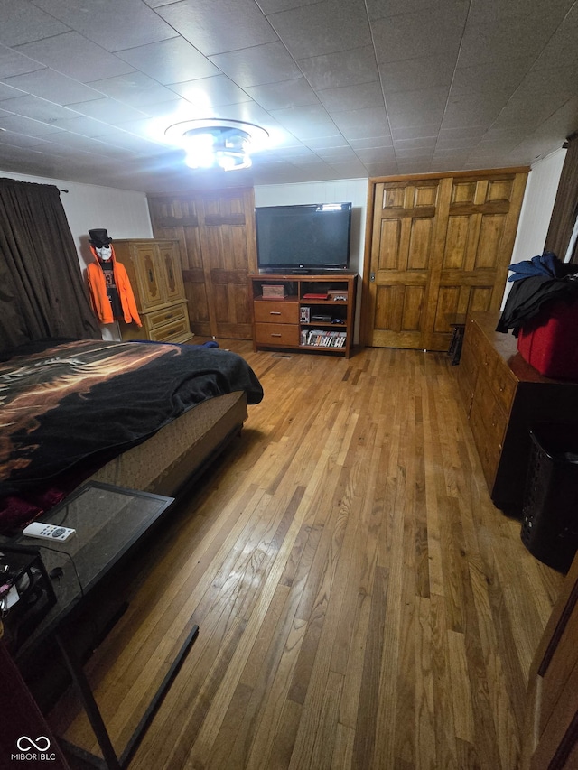 bedroom featuring light wood-style flooring