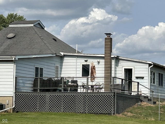 245 W Dixie Bee Rd, Veedersburg, IN 47987 - rear view of house with a chimney and a yard