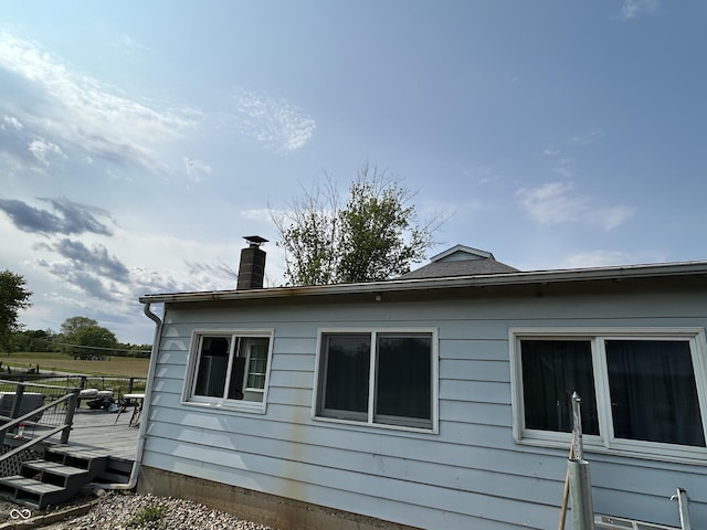 245 W Dixie Bee Rd, Veedersburg, IN 47987 - view of property exterior featuring a deck and a chimney