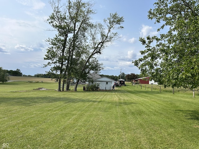 245 W Dixie Bee Rd, Veedersburg, IN 47987 - view of green lawn with an outbuilding