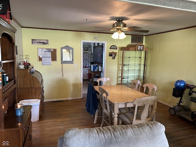 245 W Dixie Bee Rd, Veedersburg, IN 47987 - dining room featuring crown molding, wood finished floors, ceiling fan, and baseboards