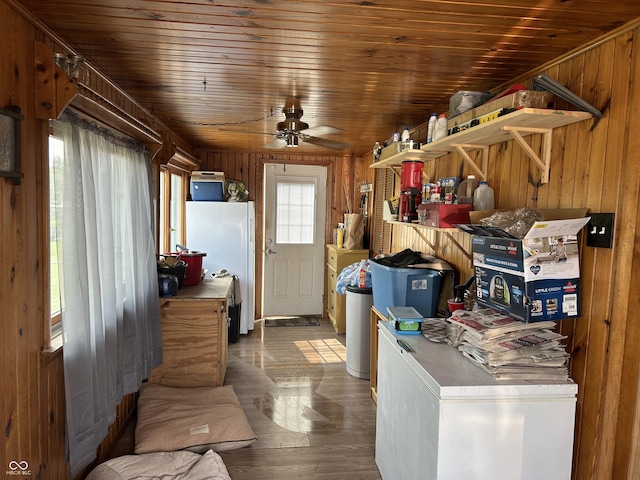 245 W Dixie Bee Rd, Veedersburg, IN 47987 - laundry room with wooden walls, wood ceiling, a ceiling fan, and wood finished floors