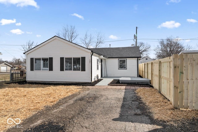 view of front of house with fence