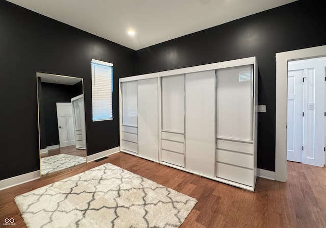 1818 N Cornell Ave, Indianapolis, IN 46202 - bedroom with a closet, wood finished floors, and baseboards