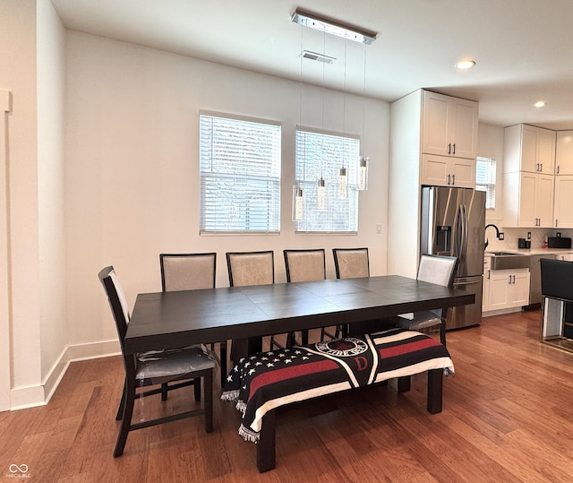1818 N Cornell Ave, Indianapolis, IN 46202 - dining room with wood finished floors, recessed lighting, healthy amount of natural light, and baseboards