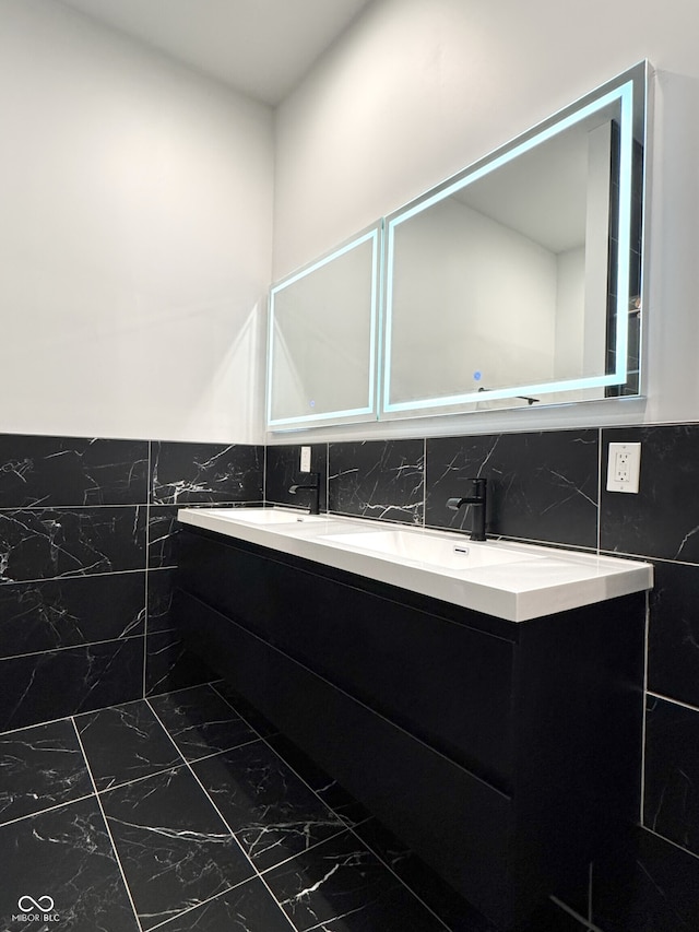 1818 N Cornell Ave, Indianapolis, IN 46202 - full bath featuring marble finish flooring, tile walls, and double vanity