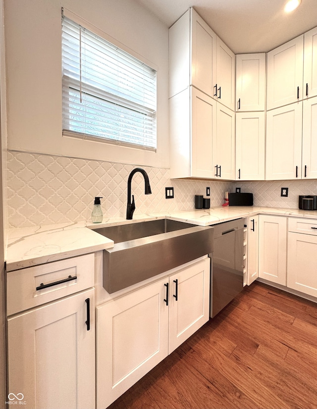 1818 N Cornell Ave, Indianapolis, IN 46202 - kitchen featuring dishwasher, a sink, dark wood-type flooring, tasteful backsplash, and white cabinets