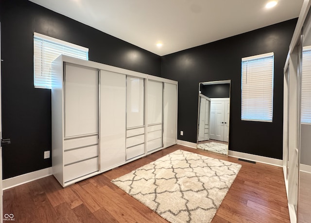 1818 N Cornell Ave, Indianapolis, IN 46202 - unfurnished bedroom with wood finished floors and baseboards