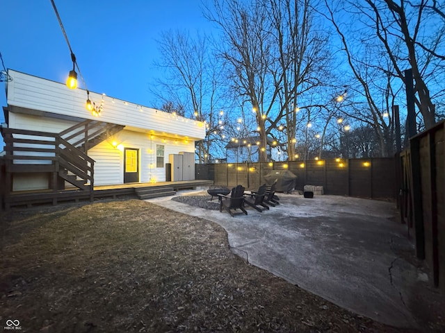 1818 N Cornell Ave, Indianapolis, IN 46202 - fenced backyard featuring a fire pit and a patio