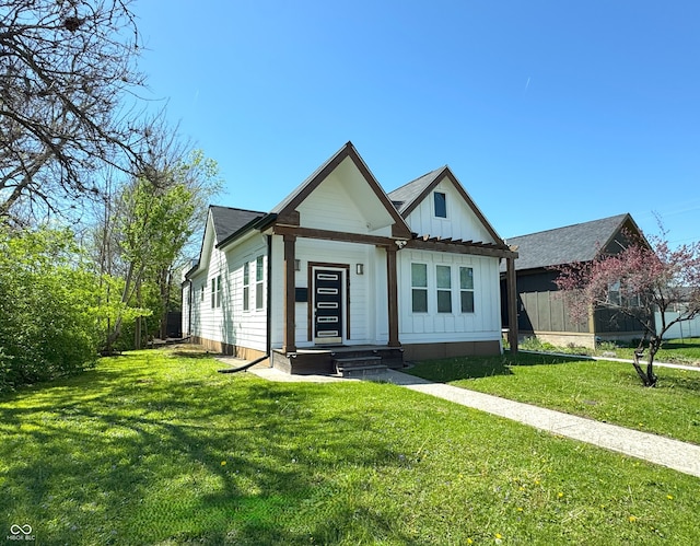 1818 N Cornell Ave, Indianapolis, IN 46202 - view of front of house featuring board and batten siding and a front lawn