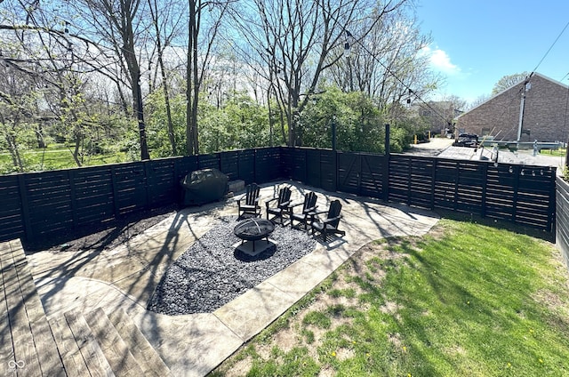 1818 N Cornell Ave, Indianapolis, IN 46202 - view of patio featuring a fire pit