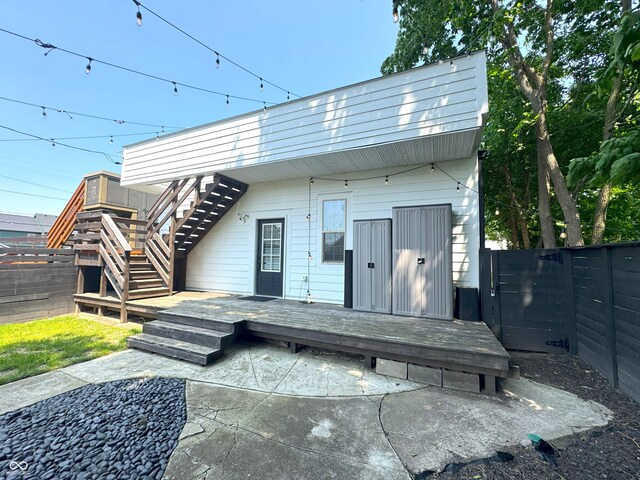 1818 N Cornell Ave, Indianapolis, IN 46202 - rear view of house featuring stairs and a wooden deck