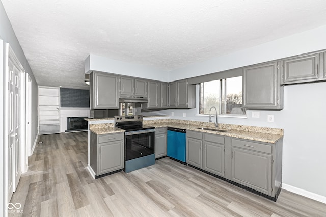 kitchen with stainless steel electric range oven, a sink, gray cabinets, and dishwasher