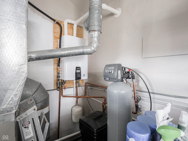 utility room with water heater