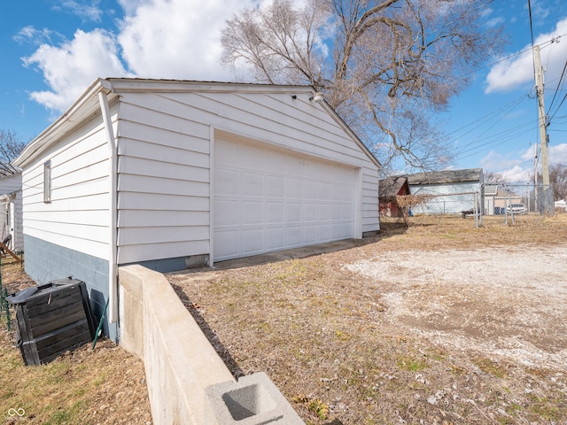 detached garage with fence