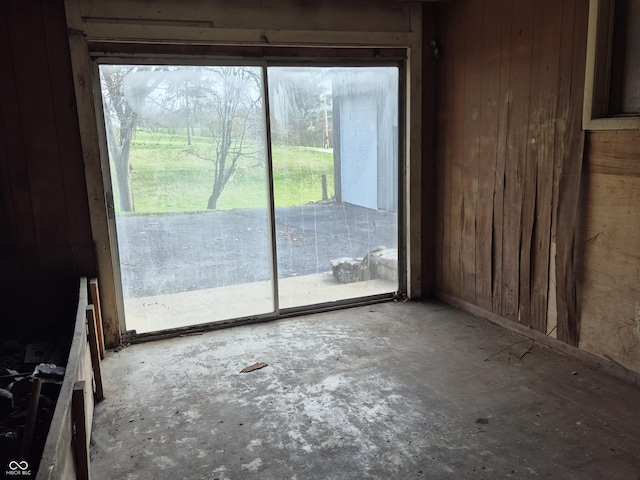 empty room with wood walls
