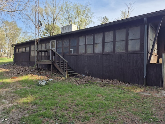 rear view of house with stairway