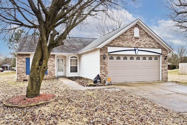 single story home featuring a garage, concrete driveway, and brick siding