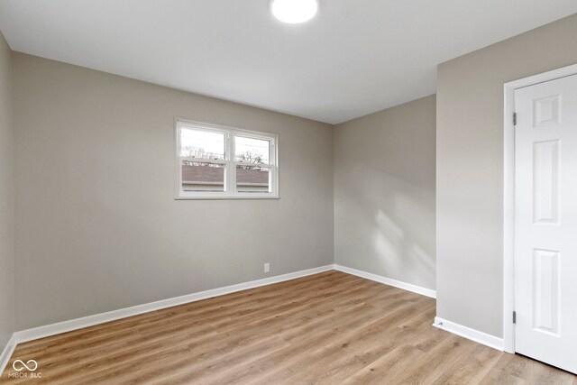305 Bixler Rd, Indianapolis, IN 46227 - spare room with light wood-style floors and baseboards