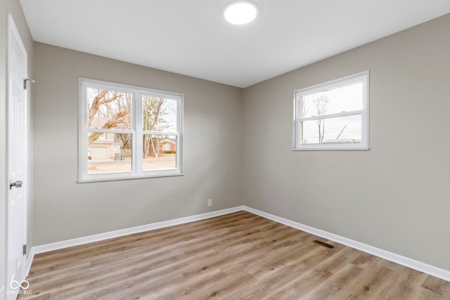 305 Bixler Rd, Indianapolis, IN 46227 - empty room with baseboards and a wealth of natural light