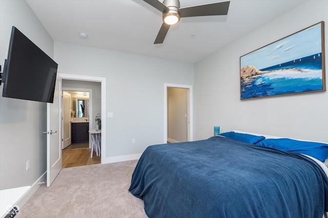 bedroom featuring ceiling fan, carpet flooring, and baseboards