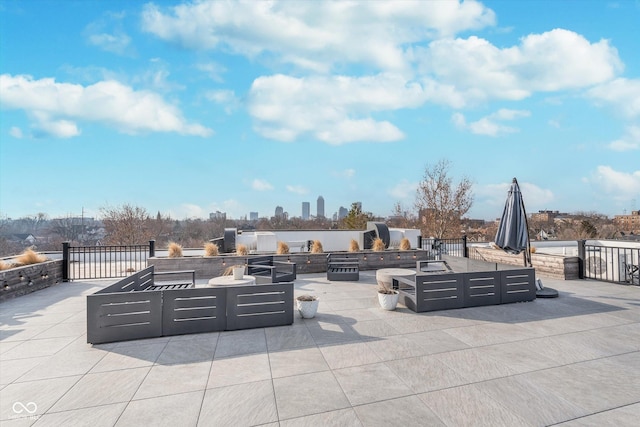 view of patio with an outdoor fire pit