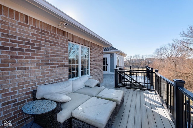 wooden deck featuring an outdoor living space