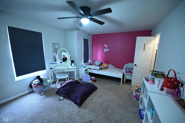 bedroom featuring carpet flooring, ceiling fan, a textured ceiling, and baseboards