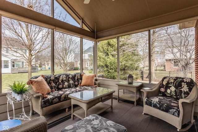 sunroom with lofted ceiling