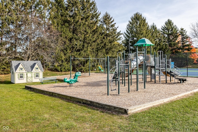 communal playground with a lawn