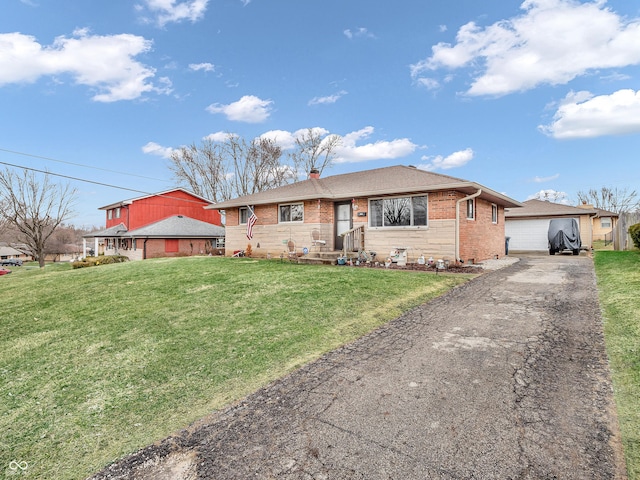 ranch-style house with brick siding, a chimney, a garage, an outdoor structure, and a front lawn