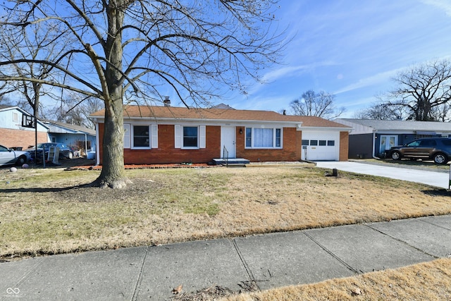 ranch-style house featuring driveway, an attached garage, a front yard, and brick siding