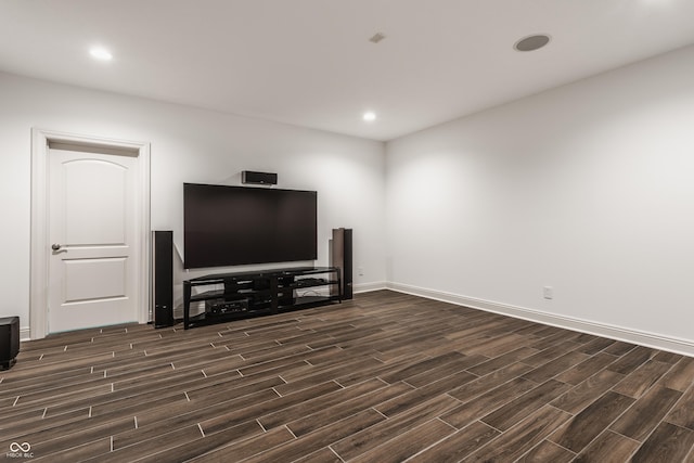 living room with wood tiled floor, baseboards, and recessed lighting