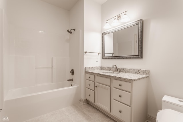 full bath with tile patterned flooring, bathtub / shower combination, vanity, and toilet