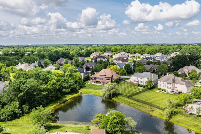 birds eye view of property featuring a water view and a residential view