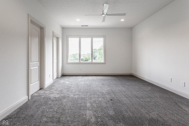 carpeted empty room featuring recessed lighting, visible vents, ceiling fan, and baseboards