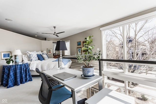 carpeted bedroom with a ceiling fan