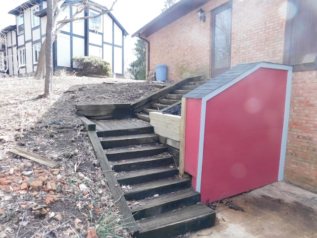 view of entry to storm shelter