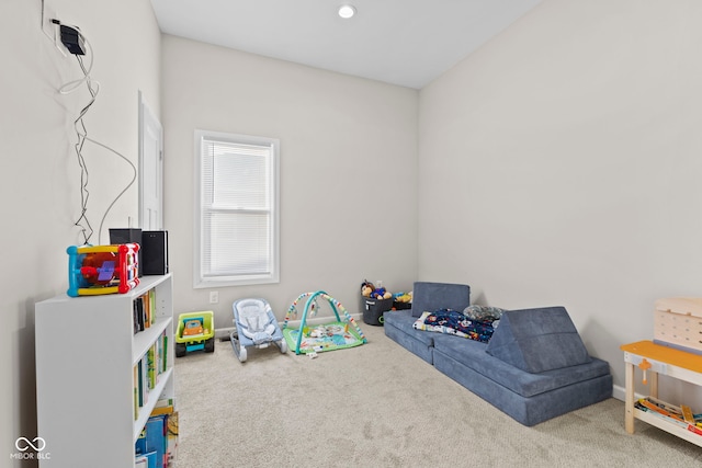 recreation room with carpet floors