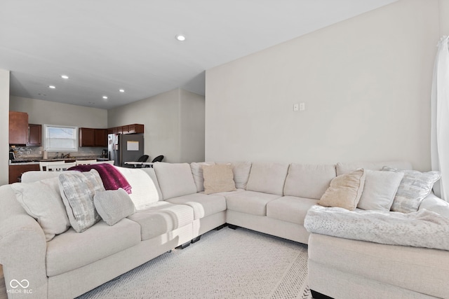 living area with recessed lighting