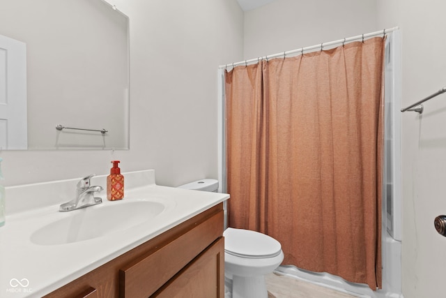 full bath with vanity and toilet