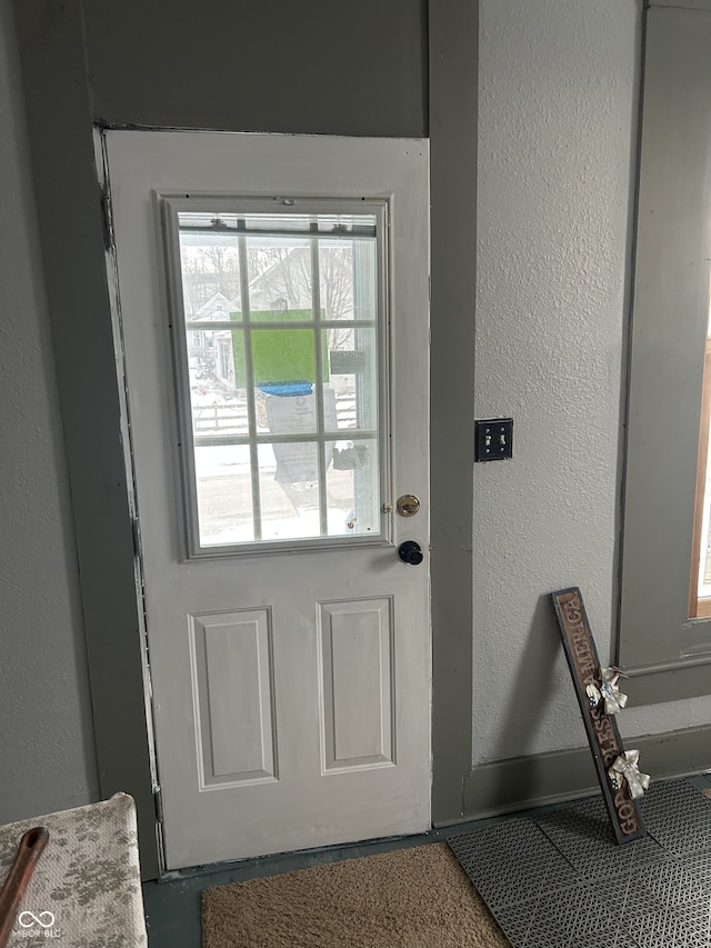 entryway with a textured wall