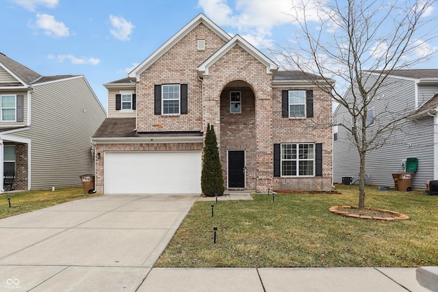 traditional-style house featuring brick siding, central air condition unit, an attached garage, driveway, and a front lawn