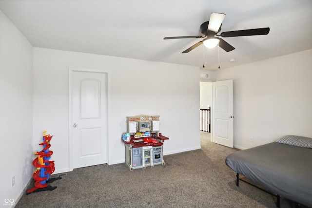 bedroom with carpet, baseboards, and ceiling fan