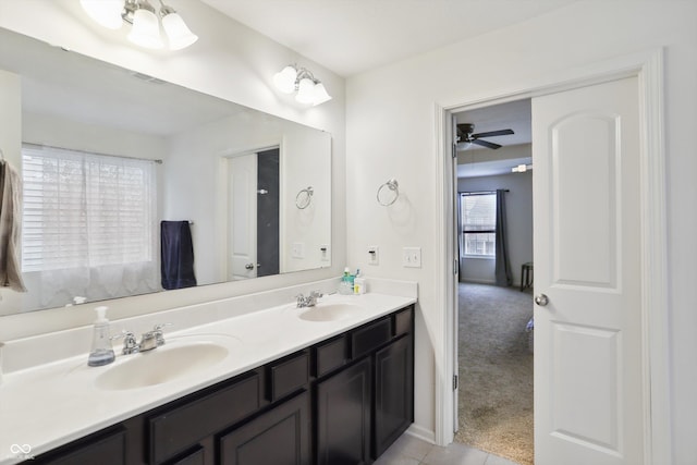 bathroom with double vanity and a sink